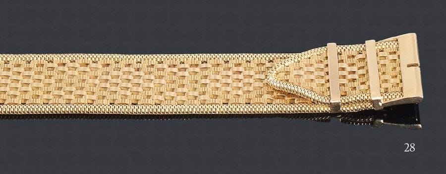 Bracelet «ceinture» en ruban d'or jaune 18K tressé. Longueur: 17,5 cm - Poids: 62,1 g