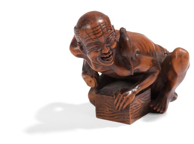 JAPON - Epoque MEIJI (1868 - 1912)

Okimono en bois, attrapeur de rat agenouillé avec une caisse, le rat sur son épaule.
(Manque).
L.: 8 cm