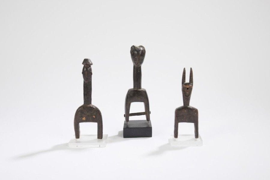 BAOULE / GOURO (REP. CÔTE d'IVOIRE)

Lot de trois poulies. 
Hauteurs: 15, 17 et 17,5 cm