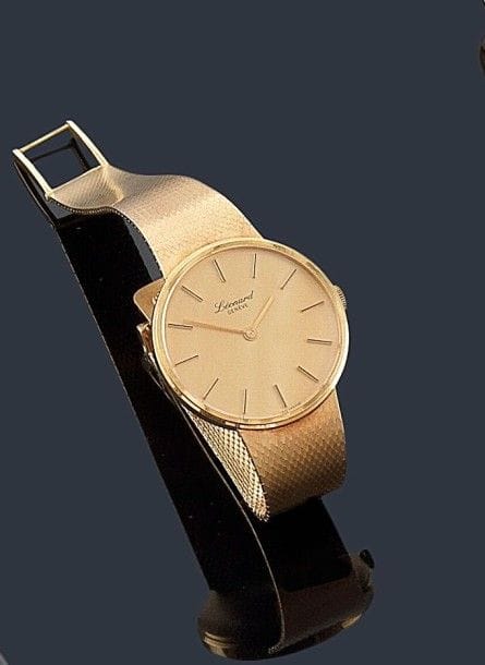 LéONARD Genève
Montre bracelet d'homme en or 18K (750 ?), trés bon état, mécanisme suisse, cadran champagne avec appliques, boucle échelle. 
Poids brut: 72,60 g