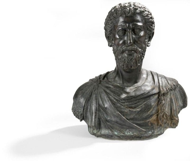 Buste en bronze patiné d'après l'antique.
Dans le goût du XVIIe siècle.
H.: 57 cm