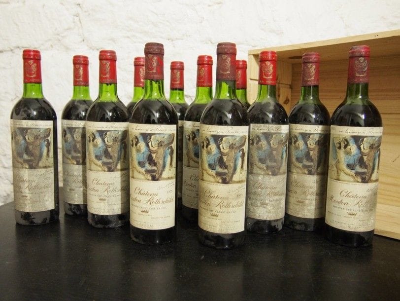 12 Bouteilles, CHÂTEAU MOUTON ROTHSCHILD, GCC1 Pauillac, 1973, (H.E. ou mieux; e.t.h; 2 c.c.).