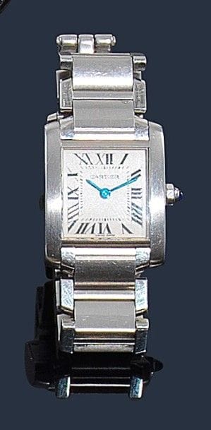 CARTIER.
Montre de dame en acier, modèle Tank Française, fond crème, index chiffres romains, bracelet acier à double boucle, mouvement quartz. Signée et numérotée 2384 109392CD. 
Longueur : 17,2 cm environ 
(on joint des maillons supplémentaires)