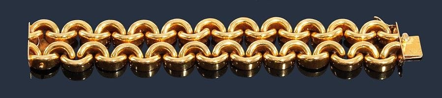 Bracelet souple en or jaune 18K (750‰) articulé de maillons arrondis. 
Longueur : 19 cm environ. Poids : 78,8 g