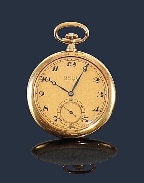 FONTANA. 
Montre gousset en or 18K (750‰), cadran doré, trotteuse à 6H, échappement à ancre. Balancier coupé compensé, 
années 30, n° intérieur 47852, chiffres arabes et aiguilles Bréguet. 
Poids brut : 57 g
Écrin. 