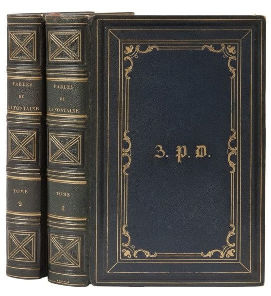 LA FONTAINE (Jean de).
Fables de La Fontaine illustrées par J. J. Grandville.
Paris : H. Fournier aîné, 1838. — 2 volumes in-8, 226 x 145 : frontispice, (2 ff.), XXVIII, 292 pp., 72 planches ; (2 ff.), 312 pp., 48 planches. Chagrin violet, encadrement de filets dorés et à froid et de volutes dorées sur les plats, chiffre B.P.D. doré au centre des premiers plats, dos à nerfs orné de motifs dorés et à froid, triple filet doré à l’intérieur, tranches dorées (R. P. Ginain).

Édition parmi les plus belles de l’époque romantique, illustrée de 14 faux titres compris dans la pagination, d’un frontispice sur chine et de 120 planches, le tout gravé sur bois d’après les dessins de Grandville.
Précieux exemplaire en reliure de l’époque signée de Ginain, réunissant au total 240 illustrations hors texte de Grandville en premier tirage sur papier vélin, c’est-à-dire les 120 de l’édition de 1838 et les 120 complémentaires parues en 1840. Les premières se reconnaissent par la présence du point à la fin de la légende, les secondes par l’absence de point. Toutes les fables de La Fontaine possèdent ainsi son illustration.
Les exemplaires ainsi formés sont d’une infinie rareté, surtout en reliure de l’époque signée, et qui plus est de R. P. Ginain, « un des meilleurs relieurs de la période romantique » d’après Fléty, qui travailla pour le roi Louis-Philippe et le prince de Joinville.
Exemplaire très bien conservé malgré les dos très légèrement passés, de petites craquelures à la charnière du premier plat du premier volume et deux coins légèrement émoussés. Quelques rousseurs éparses, essentiellement sur les serpentes.
Provenance : chiffre B.P.D. doré à l’époque sur les premiers plats.