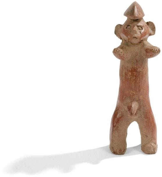 CHAMBA (NIGERIA) 
Fétiche en terre cuite 
Très beau et ancien fétiche en terre cuite à patine luisante rouge, représentant un personnage. 
Hauteur : 16 cm 

Provenance : Collection D. et M. Meynet, Lyon.