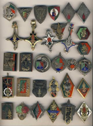 31 Insignes Légion dont 1er REP (Courtois), 11e REI x2, 12 REI (Augis), 3e BEP (DOM), 1ère CSPLE (Drago Ber)