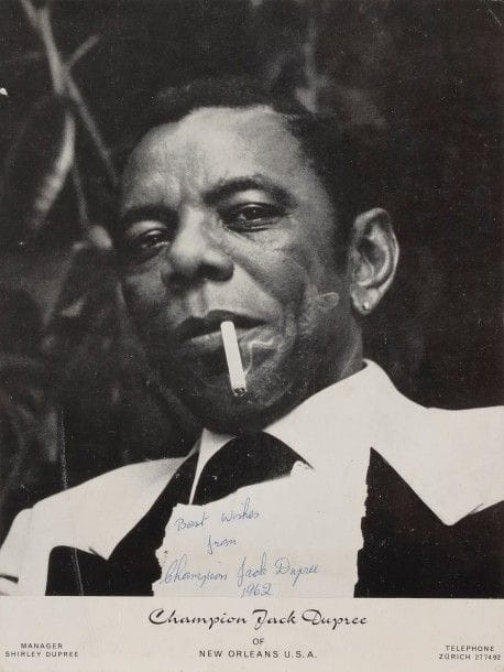 CHAMPION JACK DUPREE
Photo de presse dédicacée et signée.
Bon état.