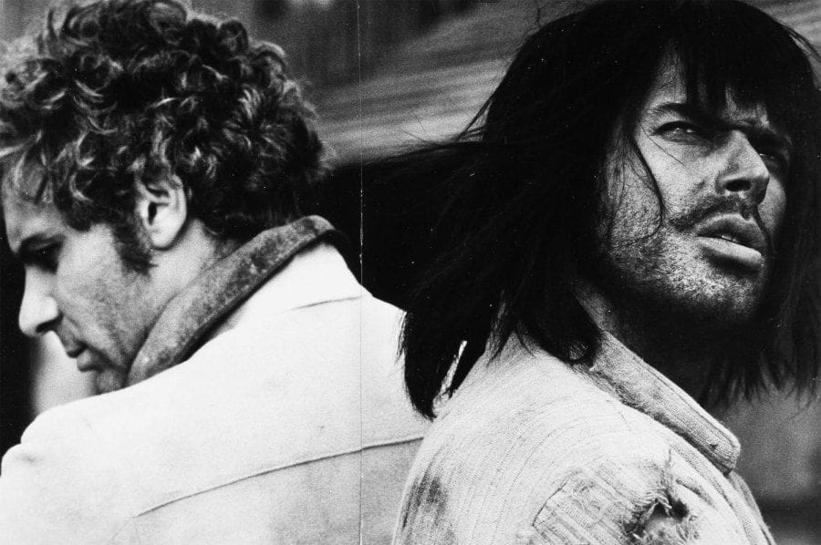 Faccia a Faccia (Il était une fois en Arizona), 1967. De Sergio Sollima, avec Tomas Milian et Gian Maria Volonté. Six tirages argentiques d'époque (cinq coupés en deux parties réunies) par Pietro Pascuttini. Tampon du photographe aux versos. Formats : 16 x 24 et 39 x 26,5 cm.
