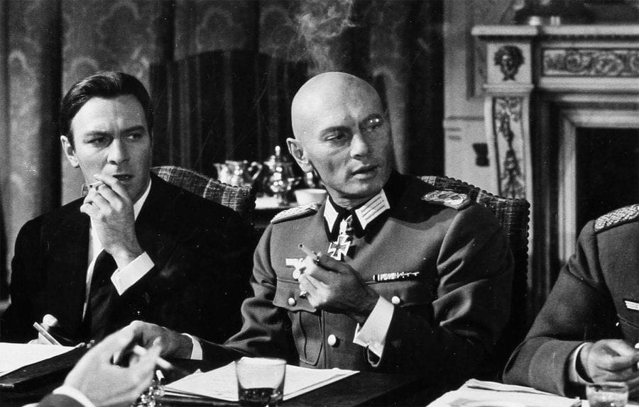 Triple cross (La fantastique histoire vraie d'Eddie Chapman), 1966. De Terence Young, avec Yul Brynner, Christopher Plummer, Romy Schneider, Gert Froebe et Claudine Auger. 11 tirages argentiques d'époque dont six par Odile Montserrat. Tampon de la photographe aux versos. Formats : de 18 x 13 à 30 x 22 cm.