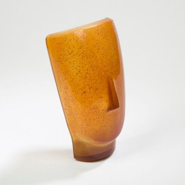 DAUM France 
Visage
Applique. Épreuve en pâte de verre ambre. Marquée DAUM en relief vers la base. H. : 25,5 cm 