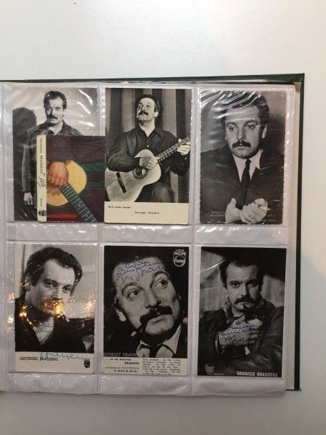 MUSIC HALL. Lot de photographies et cartes postales, certaines dédicacées. Brassens, Brel, Paul Anka, Aznavour, Bourvil, Harry Bellafonte, Barbara, Annie Cordy, Dalida, Sacha Distel, Juliette Greco, Georges Guetary, etc. (2 classeurs).