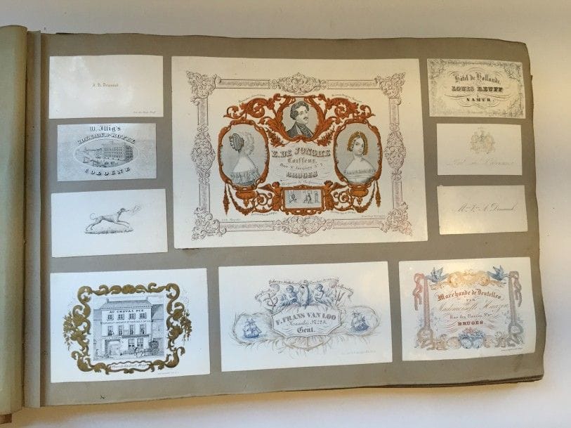 BELGIQUE. Album de cartons publicitaires, cartes de vœux, cartes de visites d'entreprises belges, vers 1900.