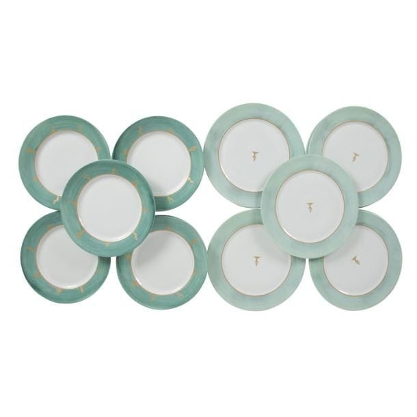 Hilton Mc CONNICO (né en 1943) pour DAUM & LIMOGES France 
Cactus 
Suite de 8 assiettes plates et 8 assiettes de présentation. Épreuves en porcelaine émaillée polychrome et dorées à l’or fin. Chacune marquée du tampon au revers. D. 26?cm & 29,5?cm 