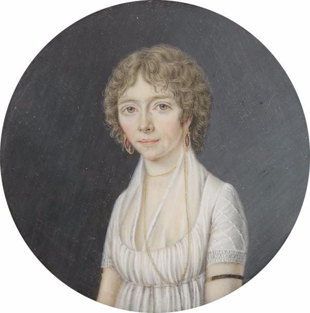 Jeune femme en robe blanche, pendants d’oreille, long sautoir au cou et bracelet noir et tour du bras noir à fermoir or
Miniature du XIXe siècle d’après un portrait de la fin du XVIIIe siècle, diam. à vue 5 cm ; dans un médaillon en or, diam. 5,3 cm, poids brut 23 gr., poinçon sur l’anneau