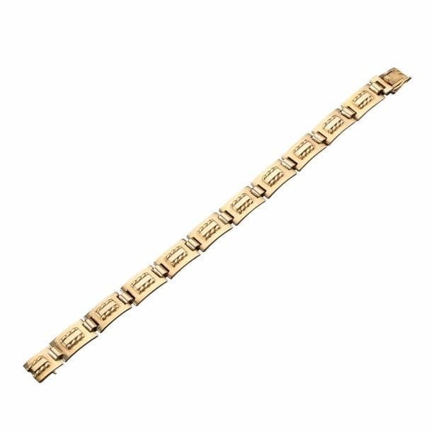 Jean DESPRÉS (1889-1980)
Rare bracelet moderniste à onze plaques rectangulaires et concaves en or jaune. 
Décor en applications, sur chacune des plaques, d'une barrette encadrée d'une section de chaîne.
Signé J. DESPRÉS à la pointe au revers d'une des plaques et porte les poinçons de Maître Orfèvre et de garantie sur le fermoir.
Poids : 22,10 g
Provenance :
Ancienne Collection M. & Mme F. (Cisery près d'Avallon - France), œuvre acquise par ces derniers directement auprès de l'artiste.