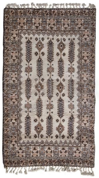 Tapis d’Afrique du nord en laine, XXe siècle
Fond ivoire à petits motifs.
205 x 154