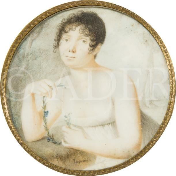 François JAQUEMIN
(Sauville-en-Lorraine, vers 1760 - après 1800).
Élève de Cammas à l’Académie royale de Toulouse, dont il remporta le grand prix. Jaquemin exposa régulièrement au Salon de Toulouse de 1777 à 1791.
Jeune Femme brune accoudée dans un paysage boisé traité en grisaille, en robe de linon blanc à taille haute, les deux mains visibles formant la lettre « C » avec une guirlande de pensées, époque Directoire-Empire
Miniature sur ivoire de la fin du XVIIIe siècle, signée en bas : Jaquemin, diam. 8,3 cm
(manque joint d’artiste au bord gauche et fendillement sous le cadre à droite), cadre en bois noirci et visière de laiton doré, rect. 14 x 13,8 cm