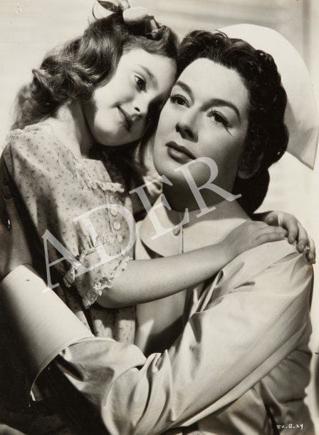 Rosalind Russell dans They met in Bombay (1941), Sister Kenny (1946) et The Girl Rush (1955). Huit épreuves d'exploitation d'époque. 25,5 x 20,5 cm.