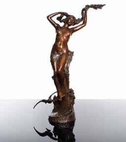 Maurice MAIGNAN (1872-1946)
La Vague épreuve en bronze, patine brun clair, signée en creux sur la tranche de la terrasse et titrée en relief sur le devant 73 x 18 x 18 cm