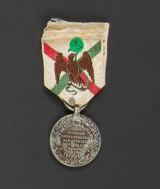 FRANCE
Médaille de la campagne du Mexique (1862-1863) par Barre.
Argent, ruban brodé.
T.T.B.