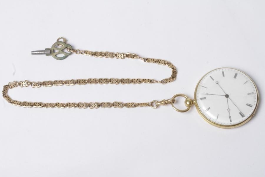 Montre de gousset en or 18K (750‰) et sa chaîne en or 18K (750‰). Poids brut : 68,1 g