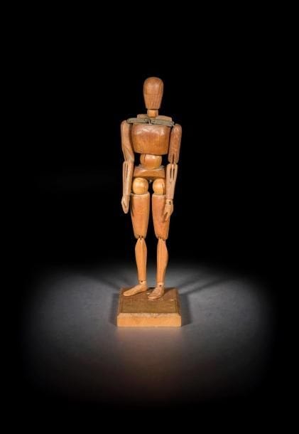 Mannequin articulé en bois sculpté et métal.
XXe siècle
H : 38 cm