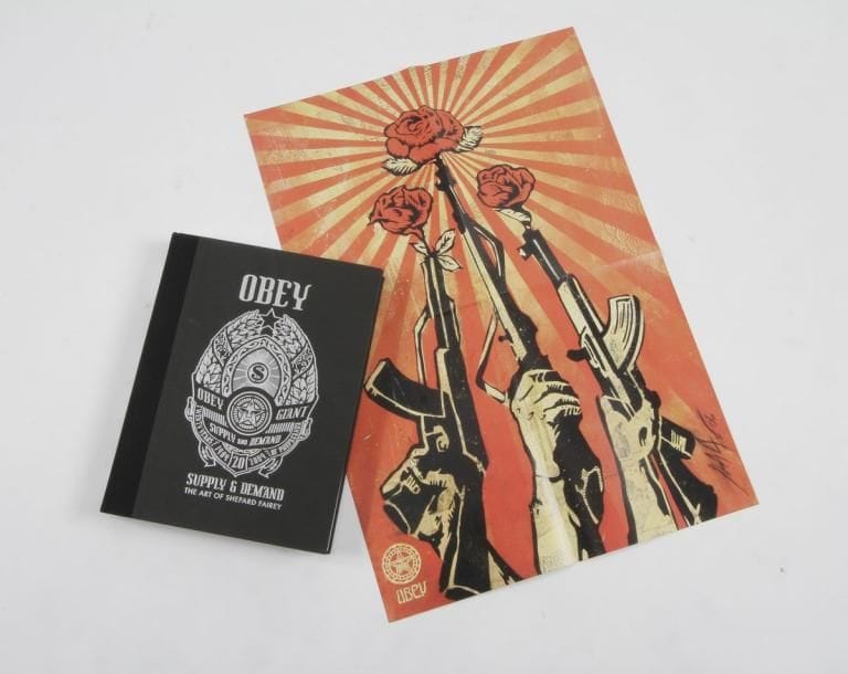 OBEY (Shepard Fairey) 
Livre « Supply & Demand : The Art of S. Fairey 1989 / 2006 » Signé par Shepard Fairey) avec le poster inclus