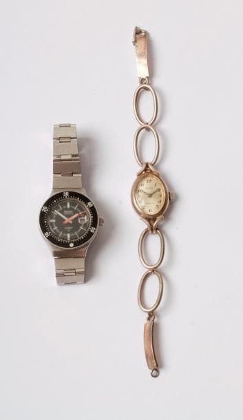 Lot de 2 montres bracelet de dame :

- ASTRAL, montre ovale en argent, maillons ovales. Poids brut : 23,90 g  

- SEIKO, montre en acier, bracelet souple en acier, date à 3H.