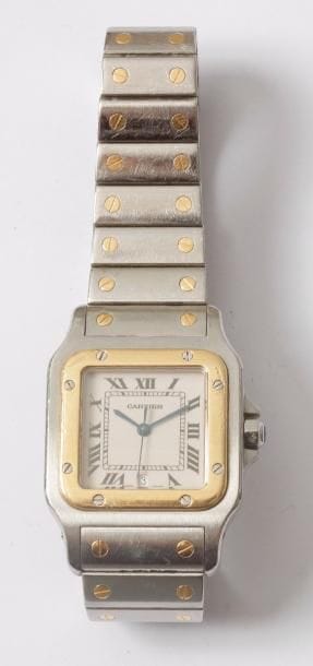 CARTIER. Montre bracelet d'homme en or et acier. Modèle Santos, à quartz. Bracelet à boucle déployante.

Poids brut : 86,75 g