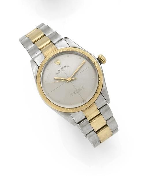 ROLEX.
Montre bracelet d’homme en or 8K (750 ‰) et acier, modèle Oyster Perpetual. Automatique, calibre 1570. Cadran anthracite, index fluo, aiguilles dorées.
Poids brut : 86,60 g 
Accident au bracelet. Bon état, à réviser.