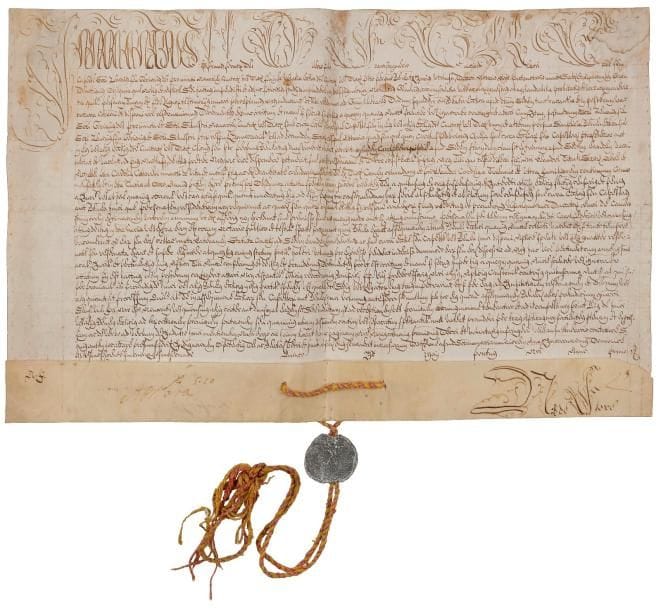 Antonio Pignatelli, Innocent XII (1615-1700) Pape en 1691. Bulle manuscrite en son nom, Rome à Sainte-Marie-Majeure 5e des ides de mai (11 mai) 1691 1re année de son pontificat ; vélin in-plano (29 x 45,5 cm), « Innocentius » et initiales des mots de la 1re ligne en grandes lettres ornées à la plume, sceau en plomb Innocentius Papa XII (usures) pendant sur cordelette rouge et jaune.
   Relative à la chapelle dite de San Silvestro et San Zeno à Novara. Une dizaine de signatures de chancellerie au bas du document.