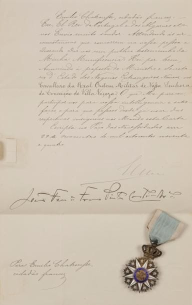 PORTUGAL. CHARLES Ier (1863-1908) Roi de Portugal. L.S., Paço das Necessidades 29 novembre 1894, au sculpteur Émile Chatrousse ; contresignée par le Président du Conseil João Ferreira Franco Pinto Castelo Branco ; 1 page in-fol., adresse avec sceau sous papier aux armes ; en portugais.
   Il le nomme chevalier de l’ordre royal militaire de Nossa Senhora da Conçeição de Villa Viçoza. On joint la décoration décernée à Chatrousse, bien complète de son ruban.
