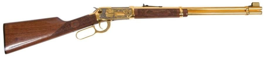 Carabine Winchester modèle 94AE « Logan County 1 of 10 », calibre 30-30 Win. 
Canon doré et gravé de 49 cm (20’’). Finition dorée, argentée et gravée (A&A ENGRAVING). Crosse en noyer sculpté de feuillages, personnages et paysages.
Longueur totale : 96 cm 
Catégorie C à déclarer. 
Exemplaire n°3 sur 10
N°6479269 