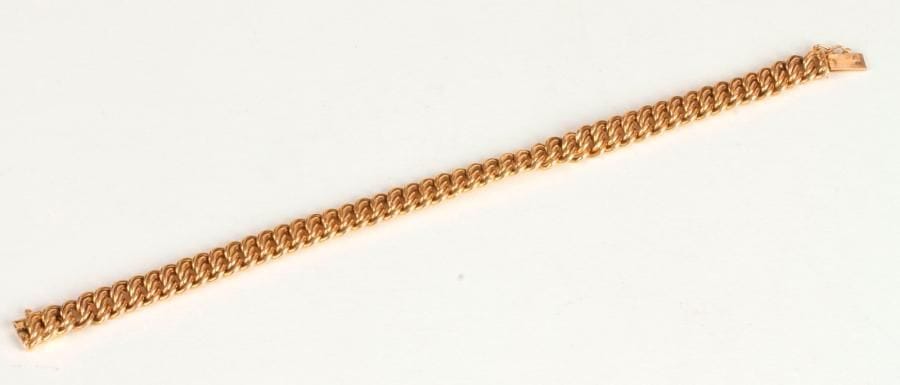 Bracelet en or 18K (750 ‰), maillons gourmette. 
Poids : 11,6 g
