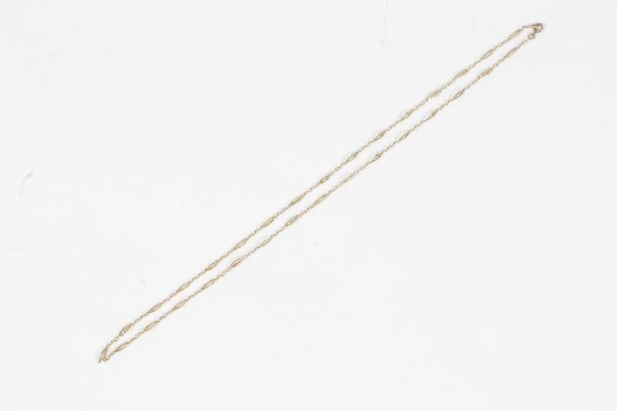 Collier en or 18K (750 ‰), articulé de maillons ovales. 
Poids : 13,9 g