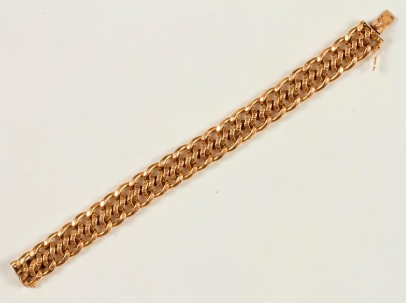 Bracelet en or 18K (750 ‰), maillons gourmette. 
Poids : 18,9 g