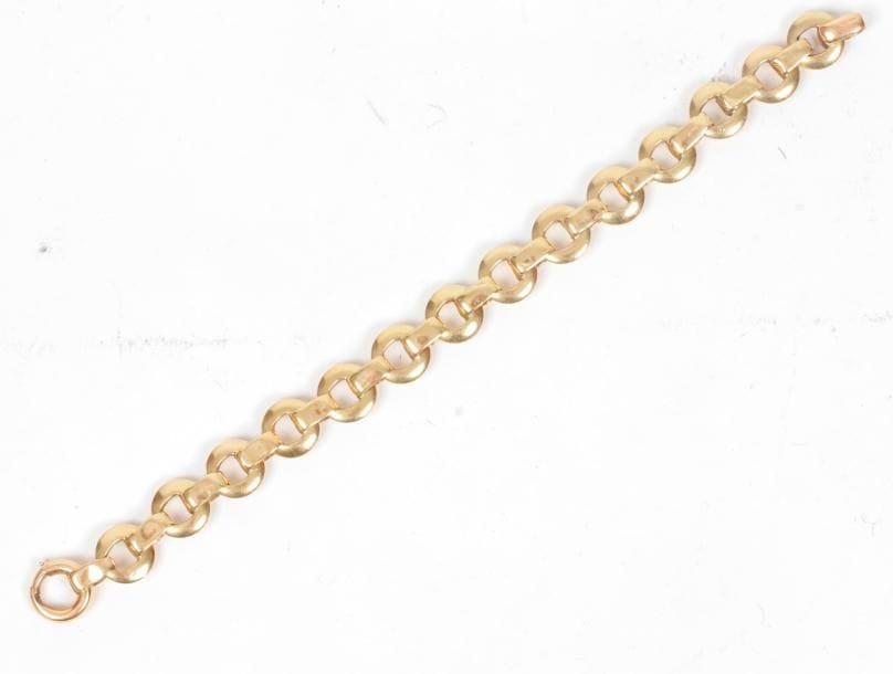 Bracelet en or 18K (750 ‰) articulé d'anneaux et barettes plats. 
Poids : 26,2 g