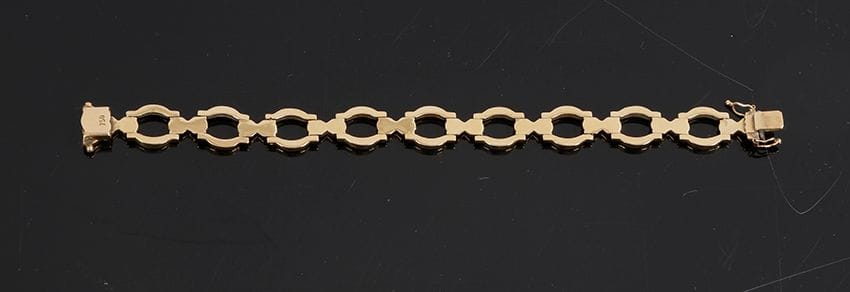 Bracelet en or 18K (750 ‰), articulé de petits maillons ovales. Longueur : 19,5 cm environ.
Poids : 18,1 g