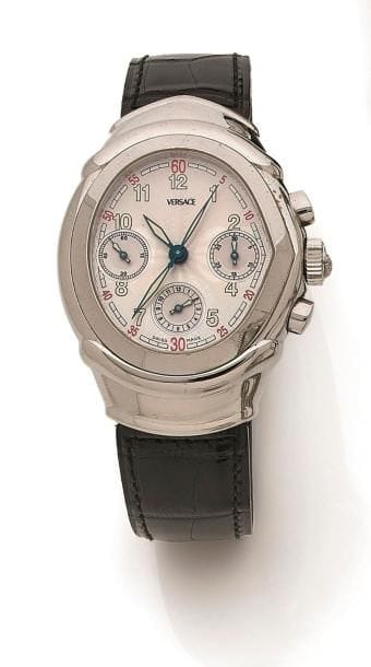 VERSACE. Montre bracelet d’homme et chronomètre en acier. Fond de boîte signé réf 4201-00-AC ,003-250. Beau mécanisme automatique, calibre Versace FM 7 000. Fond de boîte gravé à l’intérieur FRANCK MULLER, manufacture et SAV. Cadran argenté, chiffres arabes et aiguilles fluo, 3 compteurs.
Écrin et bracelet de rechange.