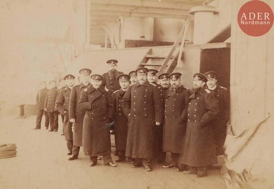 Photographies de marine
1) Photographie de groupe avec entre autres, l’ingénieur mécanicien Loukine, le capitaine de frégate Ergomychev et les lieutenants Bajenov et Stahl. Datée au dos octobre 1897.
12 x 17,3 cm
2) Photographie de groupe prise dans un carré d’officiers comportant quatre enseignes de vaisseau et un médecin de bord. Période de la première guerre mondiale.
9,5 x 14,2 cm
3) Photographie de groupe de famille ou amis, dont un lieutenant de marine en tenue d’été. Date inconnue.
7 x 23 cm
4) Une photographie amateur d’un officier de marine attablé avec son épouse. Derrière, se tiennent la domestique et l’ordonnance. L’inscription manuscrite au dos souligne la présence à droite d’un appareil téléphonique.
7,3 x 9 cm.
5) Une photographie amateur de la rade de Sébastopol avant 1914.
7,5 x 10,5 cm
6) Une photographie de groupe. Famille à bord du transport « Peterbourg ». Il s’agit sans doute du premier du nom, ancien « Thuringia » allemand.
18 x 23,8 cm

Морские фотографии
1) Групповая фотография. В центре капитан 2 ранга Константин Львович Ергомышев (1856 - 1916), командир броненосца Полтава. На обороте : октябрь 1897.
12 х 17,3 см
2) Групповая фотография снята в кают-компании военного корабля с четырьмя мичманами и судовым врачом. Времен войны 14 года.
9,5 х 14,2 см
3) Групповая фотография (семейная или круга друзей), среди которых лейтенант в летнем кителе. Без даты и места.
7 х 23 см
4) Любительская фотография морского офицера за столом с женой. За ними прислуга и денщик. На обороте надпись, которая обращает внимание, главным образом, на телефон, висящий с правой стороны на стене.
7,3 х 9 см.
5) Любительская фотография Севастопольской бухты с Черноморском флотом. До 1914 г.
7,5 х 10,5 см
6) Групповая фотография одной семьи на борту транспорта «Петербург». Наверное, первого с таким названием, бывшим немецким «Thuringia».
18 х 23,8 см