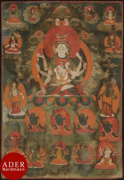 TIBET - XVIIIe/XIXe
Tangka, détrempe sur toile. Janguli Tara à trois têtes et six bras, tenant des symboles tantriques, entourée de divinités en furie, bouddhas et Tara. (Usures, taches d’humidité).
Dim. : 64,4 x 44,4 cm
