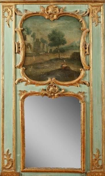 Trumeau en bois sculpté et doré sur des fonds bleus à décor de coquilles et rinceaux. A l'amortissement une huile sur toile figurant une scène pastorale. Première moitié du XVIIIe siècle (éclats). Hauteur : 140 cm - Largeur : 86 cm.