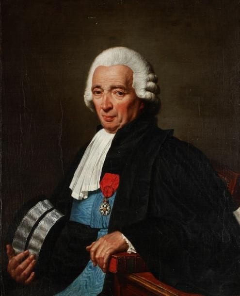 Nicolas-André MONSIAU  (Paris 1754 - 1837)
Portrait d'un magistrat, 1811 Toile 82 x 67 cm. Signée et datée en bas à droite sur le bord de la table Monsiau. Accidents.