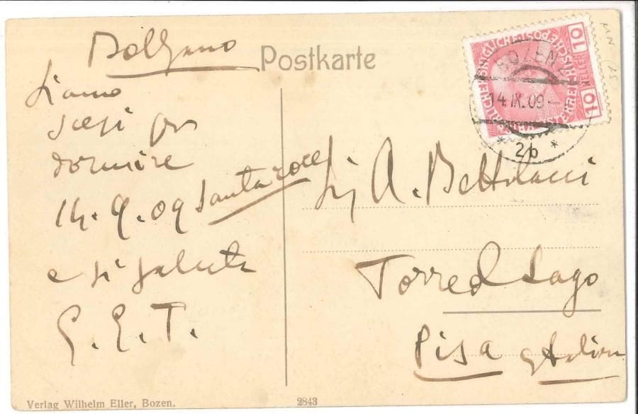 Giacomo PUCCINI (1858-1924) Carte postale as « G », Bolzano [14 septembre 1909], à son agent d’affaires Antonio Bettolacci, à Torre del Lago ; au dos d’une carte postale illustrée en couleurs, adresse ; en italien (on joint une enveloppe autogr au même)
   « Bolzano Siamo scesi per dormire 14909 Santa roce e ti salute G E T » [Giacomo, Elvira sa femme, et leur fils Tonino]
