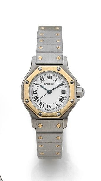 CARTIER Santos 
N°090708199.
Montre bracelet de femme en or 18K (750) et acier octogonale. Cadran index appliqués à chiffres romains, mouvement à remontage automatique, bracelet en or 18K et acier avec boucle déployante signée.
Cadran, boîtier, mouvement signés.
Poids brut : 52 g

La montre est accompagnée de son certificat.
