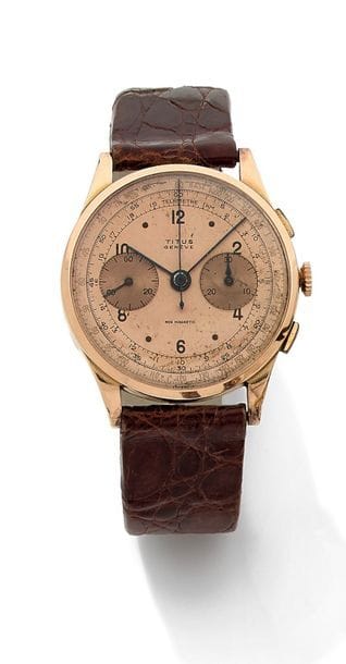 TITUS Genève
N°164
Montre bracelet en or jaune 18K (750) formant chronographe totalisateur par compteur 30 minutes, trotteuse à 9h. Cadran doré index chiffres arabes formant les heures, double boîte intérieure en métal, bracelet cuir.
Poids brut : 46,5 g