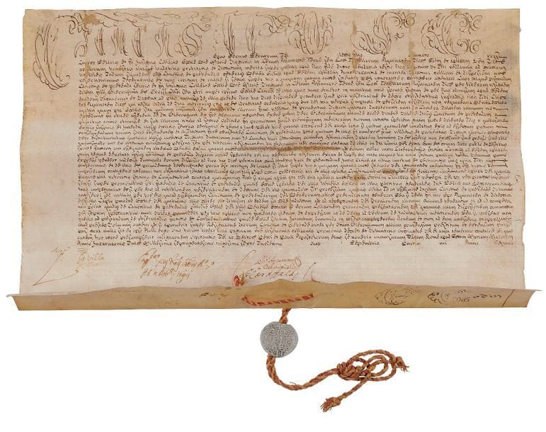 Lorenzo CORSINI, CLEMENT XII (1652-1740) Pape en 1730. Bulle manuscrite en son nom, Rome à Sainte-Marie-Majeure 21 août 1736, 7e année de son pontificat ; vélin in-plano (32 x 53 cm), « Clemens » et 5 initiales de la 1re ligne en grandes lettres ornées, sceau en plomb Clemens Papa XII pendant sur cordelette rouge et jaune (sceau un peu oxydé, petits manques et restaurations aux plis) ; en latin ; dans un coffret dépliant avec dos et bandes de maroquin rouge, titre et armes papales dorés au dos, sous étui.
   Attribution d’un canonicat en l’église collégiale Santa Maria in Celum Assumpta à Terra di Terrela dans le diocèse d’Aquino (Italie), en faveur de Fortunato Cressi, chanoine séculier de cette collégiale. Signatures de chancellerie.

