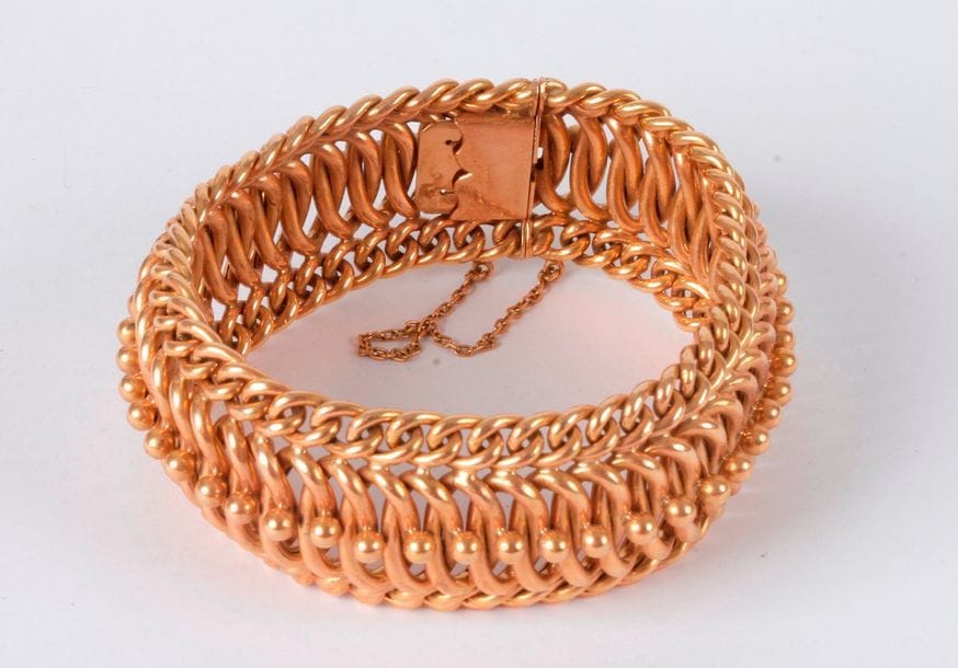 Bracelet souple en or 18K (750), articulé de maillons tressés. Poids: 40,1 g